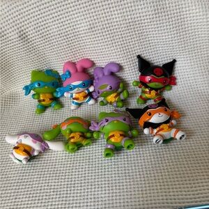 TMNT x Hello Kitty and Friends McDonalds 2025 Lot of 8 figures toy 
includes: